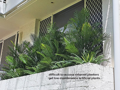 Outdoor raised planter boxes- maintenance problem solved by UV-treated artificials!