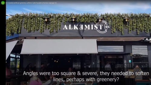 UV-treated artificial greenery softens Cafe facade & frames signage...