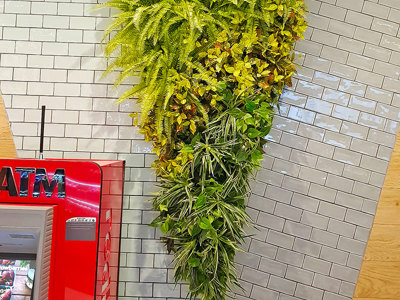 Custom-sized to fit architecture, artificial green-walls are cool!