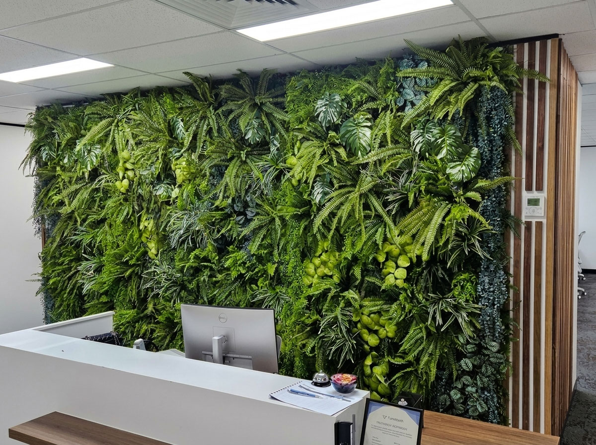 Reception with stunning artificial green-wall backing