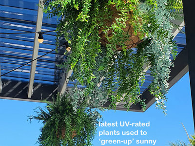 Club 'greens-up' sunny Balcony Bar with latest UV-rated artificial plants...